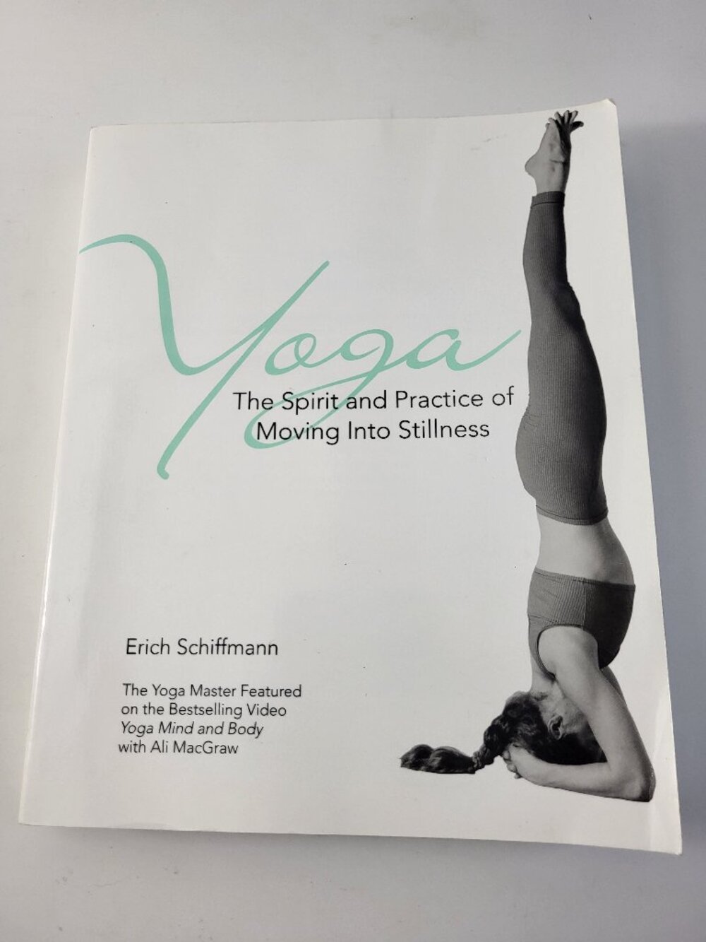Yoga: The Spirit and Practice of Moving Into Stillness by Erich Schiffmann Paper